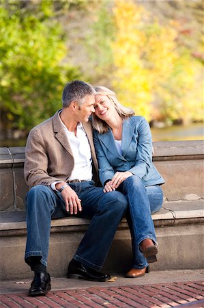 picture of two people on a park bench - Man and woman talking Stock Photo - Premium Royalty-Free, Code: 640-03261210