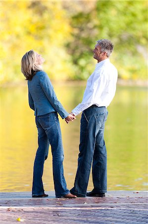 simsearch:640-03255756,k - Man and woman holding hands Stock Photo - Premium Royalty-Free, Code: 640-03261226