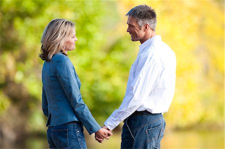 simsearch:640-03255756,k - Man and woman holding hands Stock Photo - Premium Royalty-Free, Code: 640-03261228