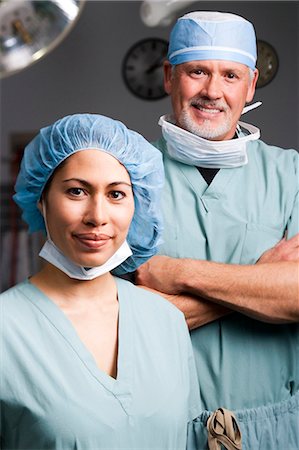 face of doctor and nurse - Medical personnel in surgery Stock Photo - Premium Royalty-Free, Code: 640-03261422
