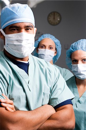 portrait and woman and closeup and arms - Medical personnel in surgery Stock Photo - Premium Royalty-Free, Code: 640-03261423