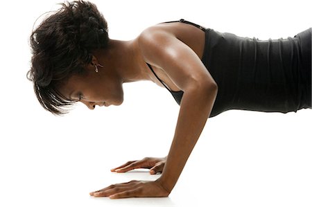 pushup woman - Woman doing pushups Stock Photo - Premium Royalty-Free, Code: 640-03261501