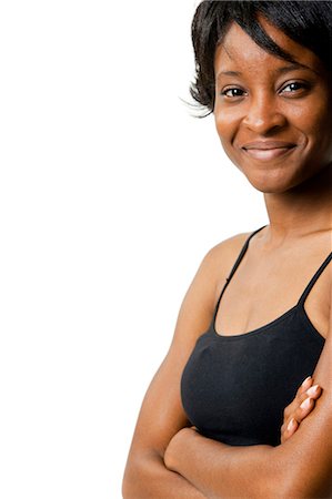 Femme debout avec les bras croisés Photographie de stock - Premium Libres de Droits, Code: 640-03261517