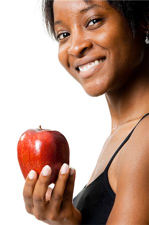 Woman with red apple Stock Photo - Premium Royalty-Free, Code: 640-03261528