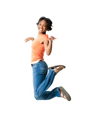 exhilarating - Female leaping Foto de stock - Sin royalties Premium, Código: 640-03261551