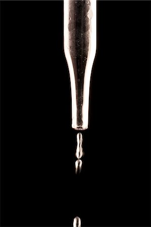 Glass dropper close-up Stock Photo - Premium Royalty-Free, Code: 640-03261588