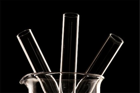 Beaker with test tubes Stock Photo - Premium Royalty-Free, Code: 640-03261580