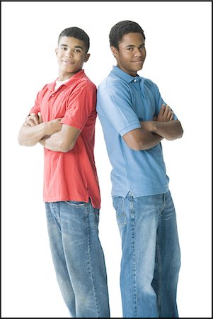 simsearch:640-02770178,k - teenage boys standing with arms crossed Foto de stock - Royalty Free Premium, Número: 640-03261629