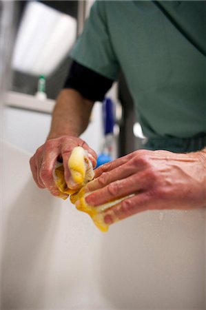 doctor washing hands - Surgeon washing his hands Stock Photo - Premium Royalty-Free, Code: 640-03261650