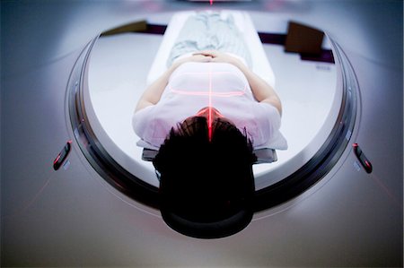 patient alone - Woman having an MRI Stock Photo - Premium Royalty-Free, Code: 640-03261716