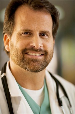 simsearch:640-03255827,k - Portrait of a male doctor smiling Stock Photo - Premium Royalty-Free, Code: 640-03261966