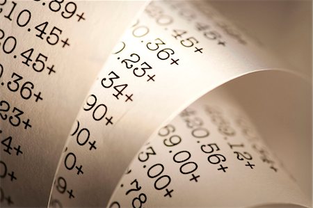 Adding machine tape closeup Stock Photo - Premium Royalty-Free, Code: 640-03262050