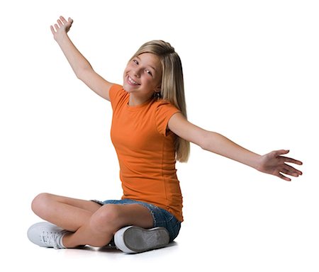 simsearch:640-03265307,k - Girl sitting with arms and legs crossed Stock Photo - Premium Royalty-Free, Code: 640-03262314