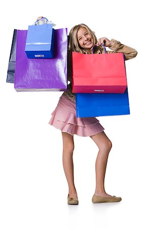 simsearch:640-02773934,k - Girl with shopping bags Foto de stock - Royalty Free Premium, Número: 640-03262332