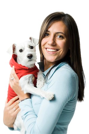 simsearch:640-01355830,k - Woman with white dog in hooded sweatshirt Foto de stock - Sin royalties Premium, Código: 640-03262430