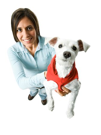 simsearch:640-01355830,k - Femme avec un chien blanc à capuche Photographie de stock - Premium Libres de Droits, Code: 640-03262432