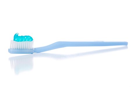 Toothbrush with toothpaste Stock Photo - Premium Royalty-Free, Code: 640-03262484