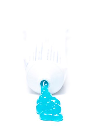 Toothpaste spilling out of tube Stock Photo - Premium Royalty-Free, Code: 640-03262487