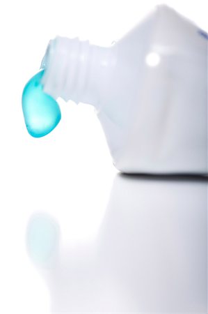 Toothpaste tube with dripping toothpaste Stock Photo - Premium Royalty-Free, Code: 640-03262492