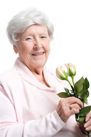 picture of old lady smiling - Portrait of an elderly woman smiling Stock Photo - Premium Royalty-Free, Code: 640-03262548