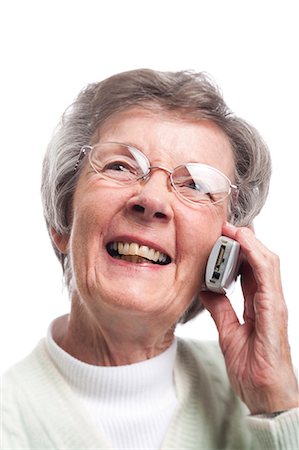 elderly on cellphone - Mature woman talking on cellular phone Stock Photo - Premium Royalty-Free, Code: 640-03262557