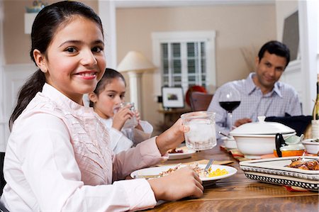 family, dining table, happy - Girls at dinner table eating Stock Photo - Premium Royalty-Free, Code: 640-03262706