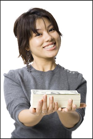 simsearch:640-03260699,k - Woman with stack of US currency smiling Foto de stock - Sin royalties Premium, Código: 640-03263124