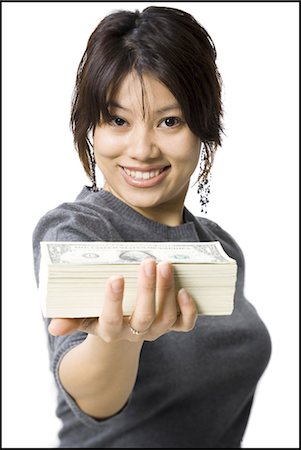 simsearch:640-03260699,k - Woman with stack of US currency smiling Foto de stock - Sin royalties Premium, Código: 640-03263125