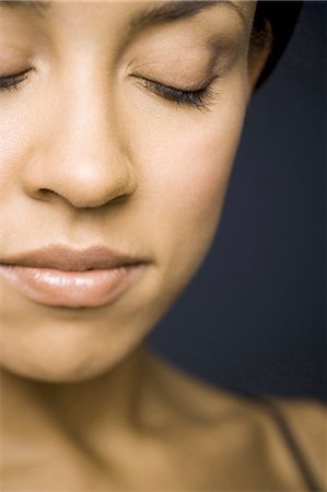 simsearch:640-03262363,k - Closeup of woman with closed eyes Foto de stock - Sin royalties Premium, Código: 640-03263144