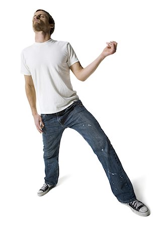 rocking out - Man playing air guitar Stock Photo - Premium Royalty-Free, Code: 640-03263288