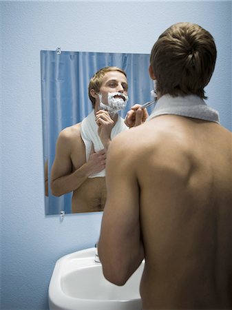 shaving cream - Male grooming himself Stock Photo - Premium Royalty-Free, Code: 640-03263323