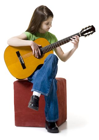 simsearch:640-03263387,k - Girl playing the guitar Fotografie stock - Premium Royalty-Free, Codice: 640-03263382