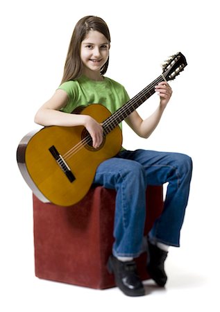 female with guitar silhouette - Girl playing the guitar Stock Photo - Premium Royalty-Free, Code: 640-03263383