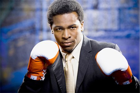 pictures of black male boxers sports - Businessman boxing Stock Photo - Premium Royalty-Free, Code: 640-03263488