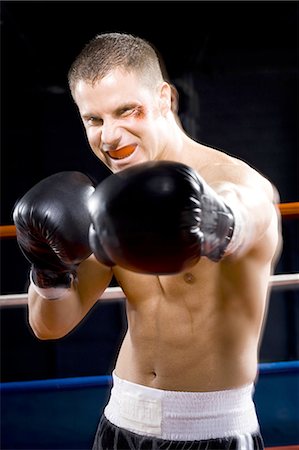 punching - Boxer Photographie de stock - Premium Libres de Droits, Code: 640-03263536