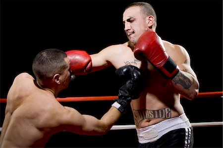 Boxers fighting Stock Photo - Premium Royalty-Free, Code: 640-03263552