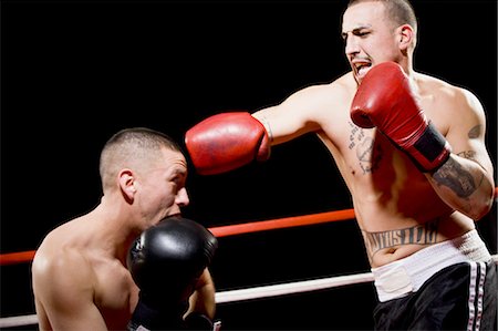 punching black people - Boxers fighting Stock Photo - Premium Royalty-Free, Code: 640-03263553