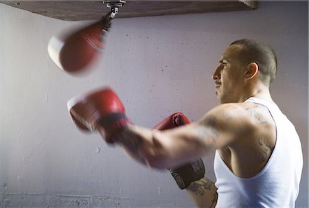 punching bag - Boxer Stock Photo - Premium Royalty-Free, Code: 640-03263572