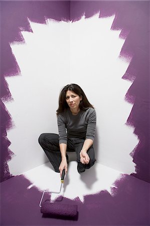 simsearch:640-03263616,k - Woman painting herself into a corner Stock Photo - Premium Royalty-Free, Code: 640-03263597