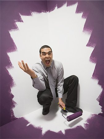 simsearch:640-03263616,k - Man painting himself into a corner Stock Photo - Premium Royalty-Free, Code: 640-03263610