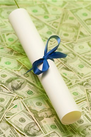 Diploma Roll Royalty-Free Images, Stock Photos & Pictures