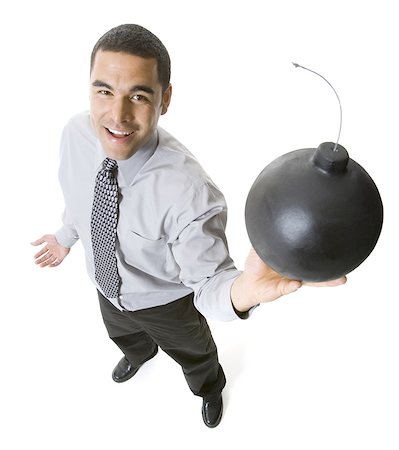 explosif - Homme tenant un boulet de Canon Photographie de stock - Premium Libres de Droits, Code: 640-03263647