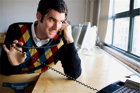 récepteur - Homme au téléphone Photographie de stock - Premium Libres de Droits, Code: 640-03263834