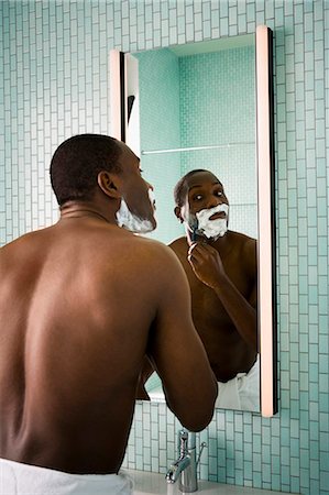 espuma de afeitar - Male shaving Foto de stock - Sin royalties Premium, Código: 640-03263869