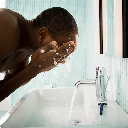 Male washing face Foto de stock - Sin royalties Premium, Código: 640-03263871