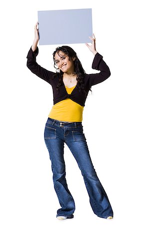 Teenage girl with blank sign Stock Photo - Premium Royalty-Free, Code: 640-03434007