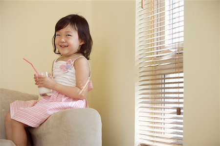 simsearch:642-01734328,k - Girl holding glass of milk and smiling Stock Photo - Premium Royalty-Free, Code: 642-01734270