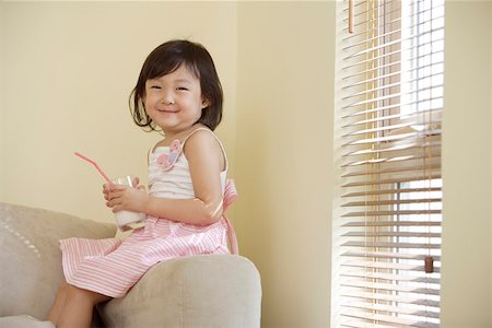 simsearch:642-01734328,k - Girl holding glass of milk and smiling Stock Photo - Premium Royalty-Free, Code: 642-01734271