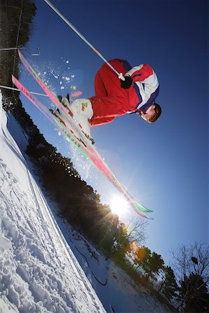 ski jumping - Skiing young man Fotografie stock - Premium Royalty-Free, Codice: 642-01734559