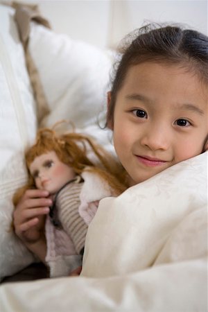 simsearch:642-01734328,k - Portrait of a girl holding doll Stock Photo - Premium Royalty-Free, Code: 642-01735031